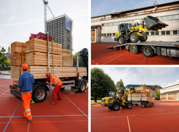 Sportplatz Waesserwies Arbeiter entladen Holzelemente und LKW mit Bagger